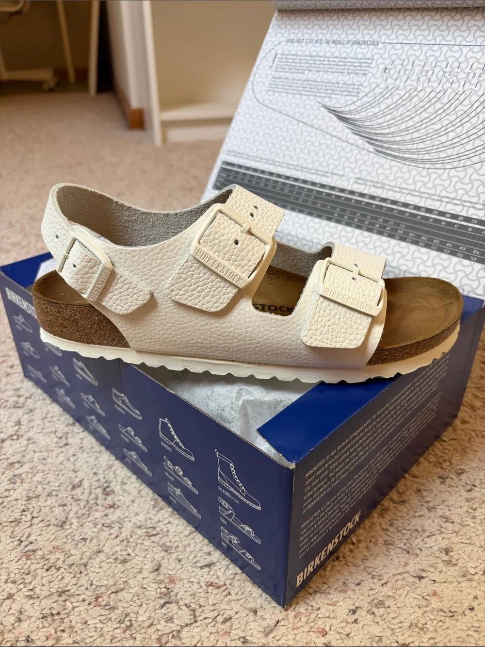 Narrow Birkenstock Cream White Two-Strap Sandal with Buckles